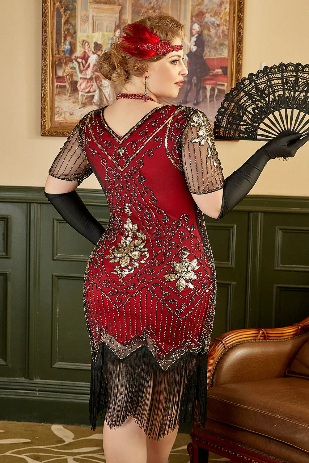 Abito rosso dorato con frange di paillettes Gatsby anni '20