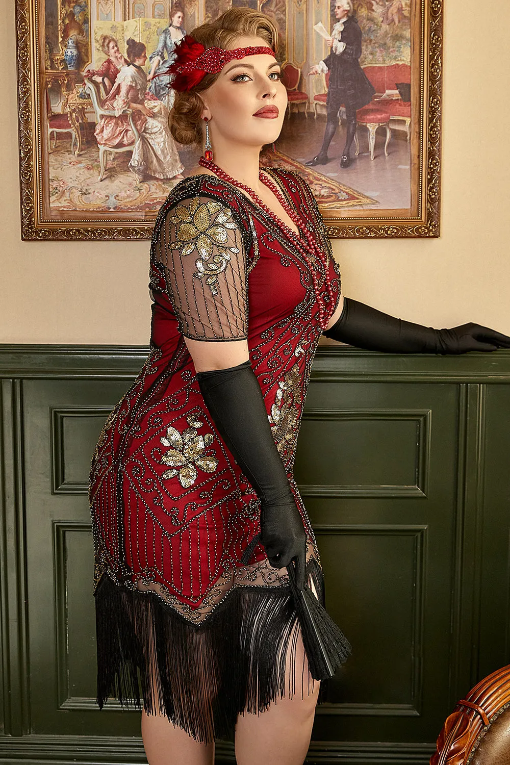 Abito rosso dorato con frange di paillettes Gatsby anni '20