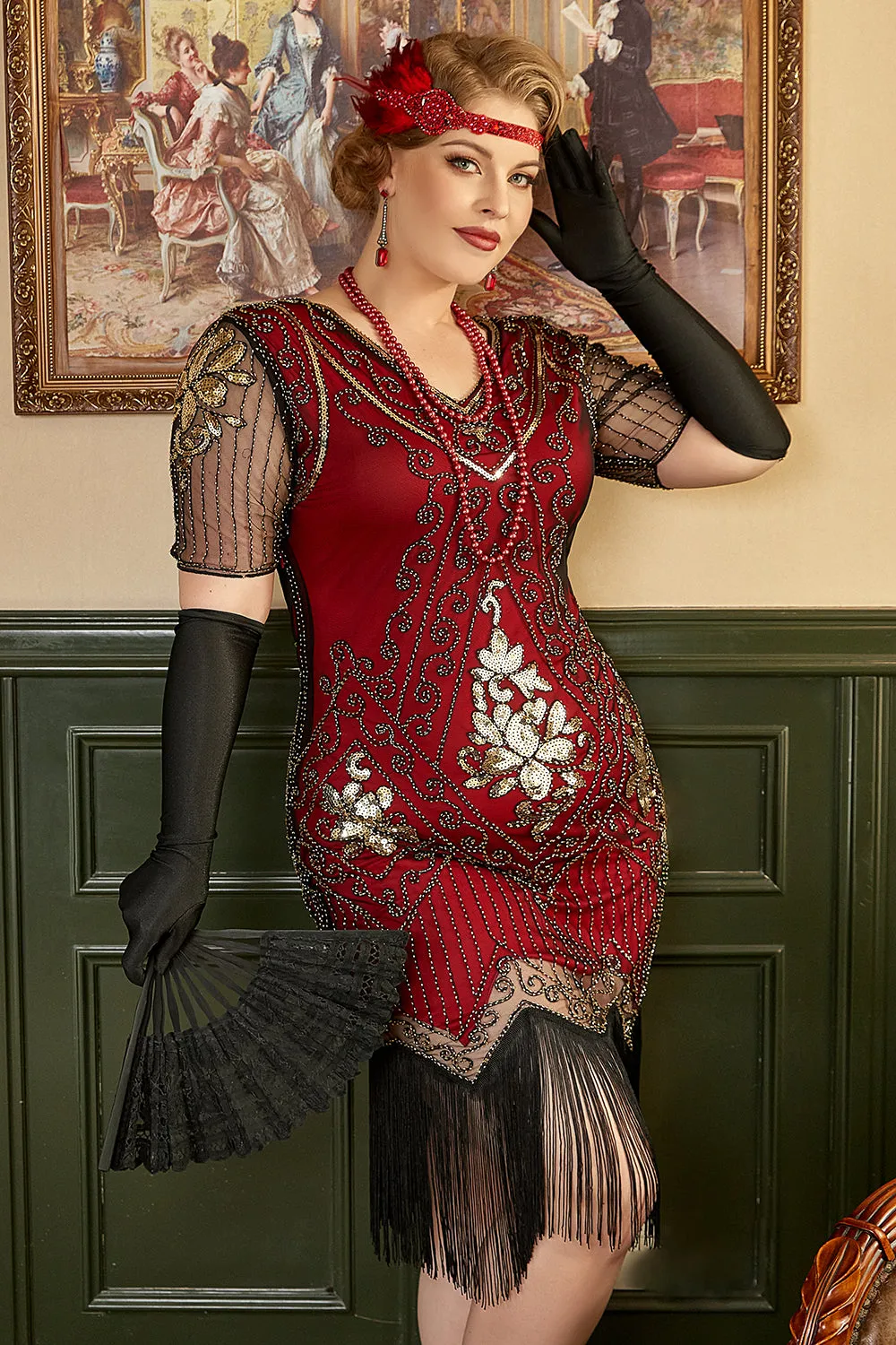 Abito rosso dorato con frange di paillettes Gatsby anni '20