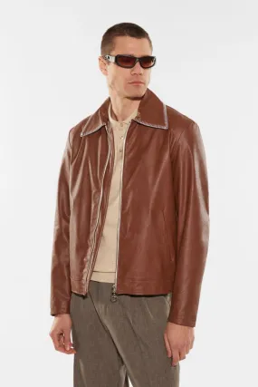 Giubbotto in similpelle monocolour con collo alto e zip