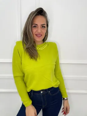 Maglione con spalline e catena tono su tono